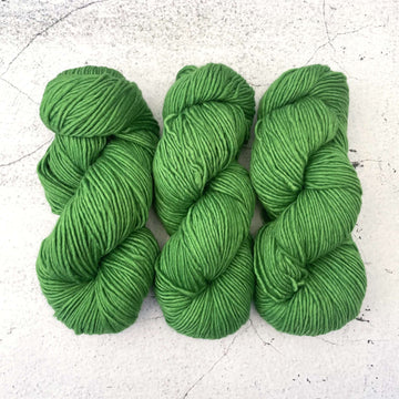 3 skeins of Malabrigo Worsted yarn in Sapphire Green colourway.