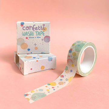 Two boxes and a roll of Hannakin brand washi tape in the design Confetti, featuring colourful watercolour splots, dots and crosses.