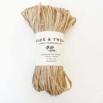A bundle of Madagascar Raffia by Flax & Twine in the Natural colourway.